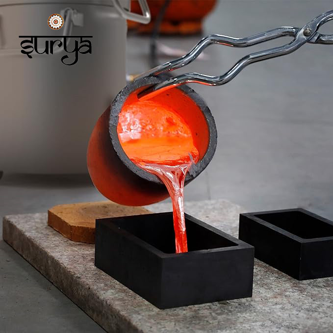 Hot graphite crucible pouring melted gold into a mold, showcasing precise casting process for metal shaping and refining.