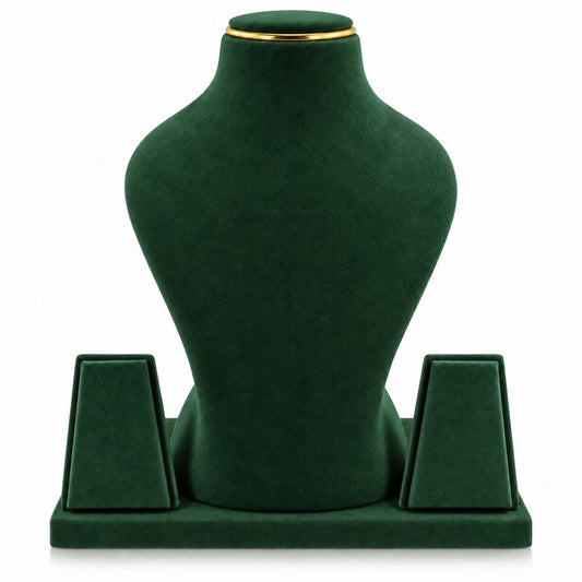 A dark green velvet jewelry display bust with a gold trim at the neck, set on a matching rectangular base with two side supports, photographed against a plain white background.