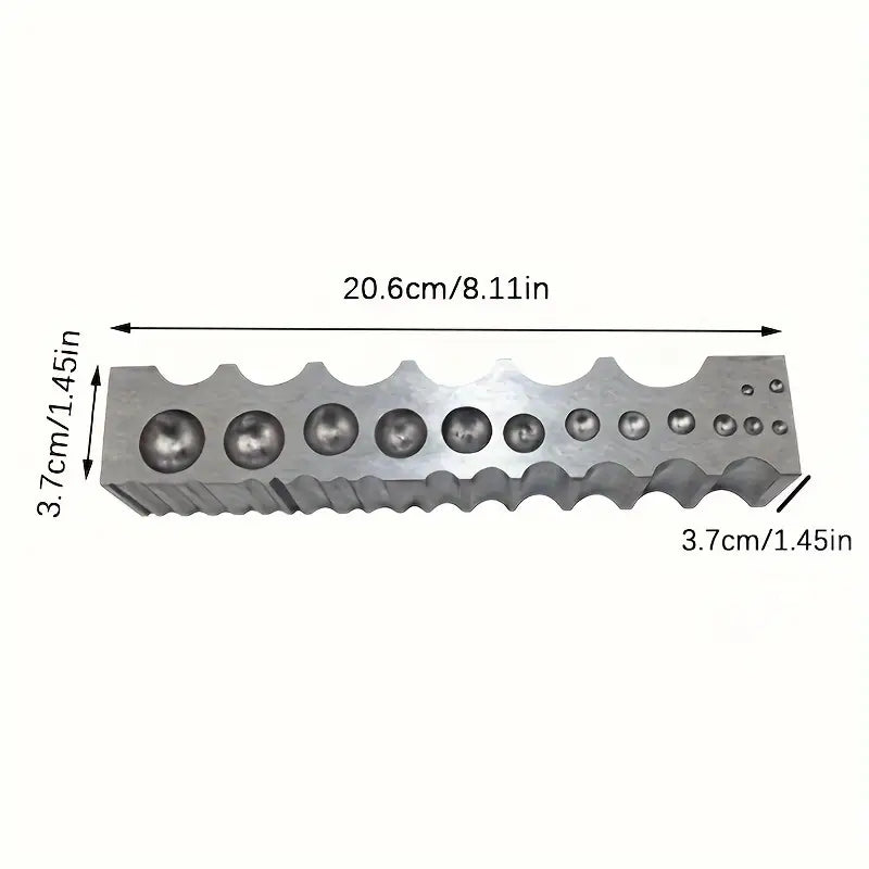 Metal doming block dimensions: 20.6 cm x 3.7 cm, with multiple sizes of round depressions for shaping rings