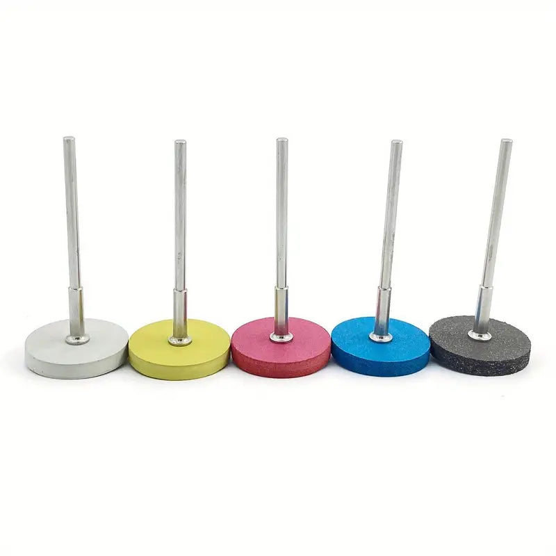 Five polishing pads in different colors