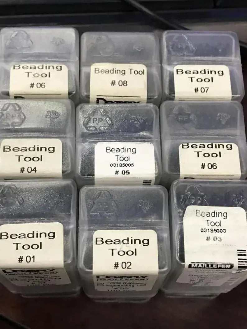 High-quality beading tools neatly packed in box, used for secure diamond and stone setting in jewelry manufacturing