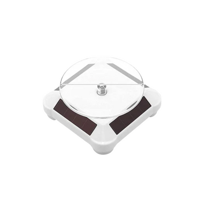 White solar-powered rotating display stand with 9 cm turntable for showcasing jewelry, watches, and small products